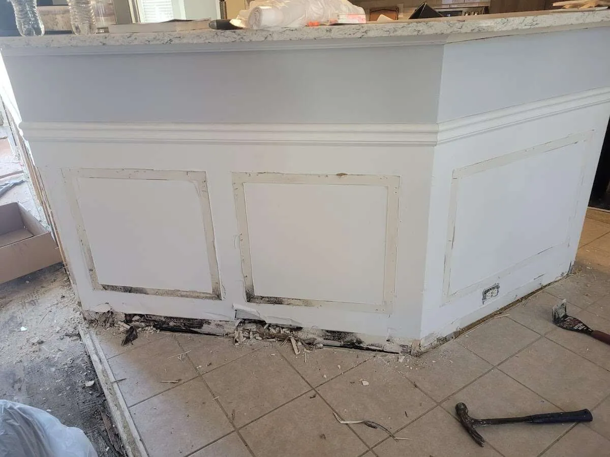 Water damage and mold on kitchen during Storm Damage Restoration in Woodhaven